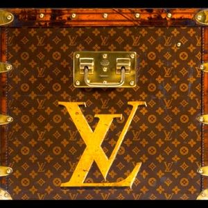 A Louis Vuitton basket/holds thing for traveling